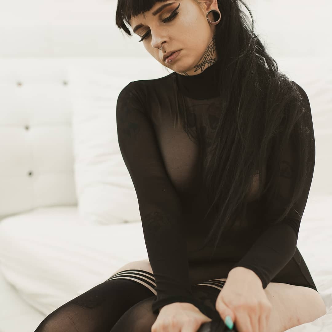 Bold Elegance: Black Bodysuit Lifestyle Portrait