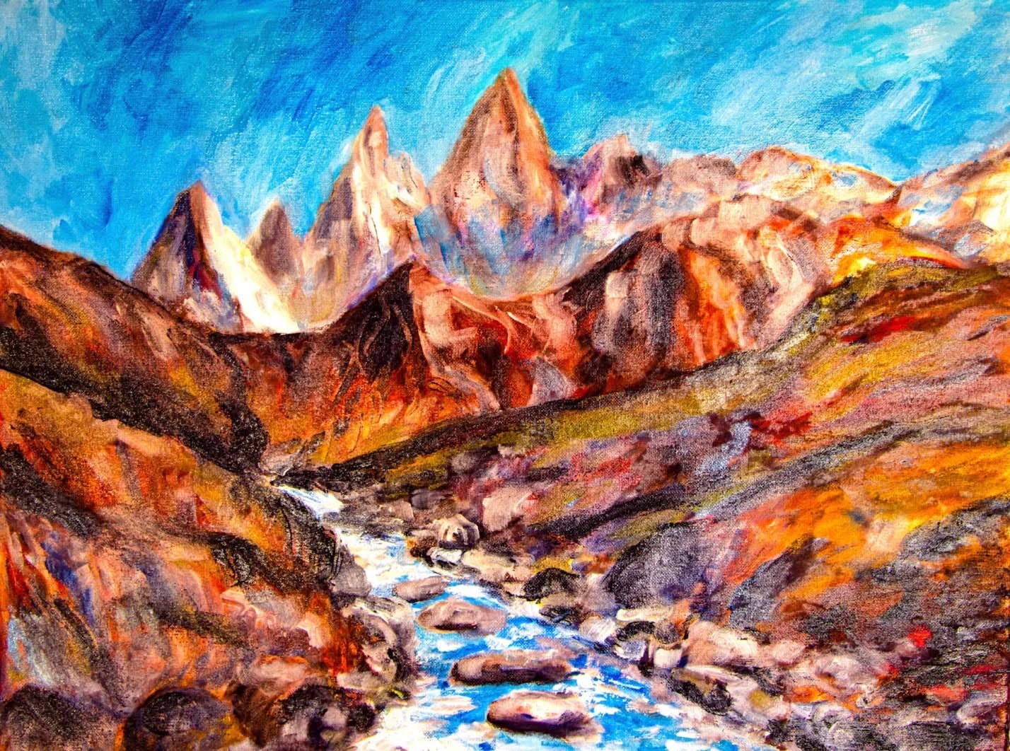 Glowing Peaks and Rushing Stream: A Serene Mountain Landscape