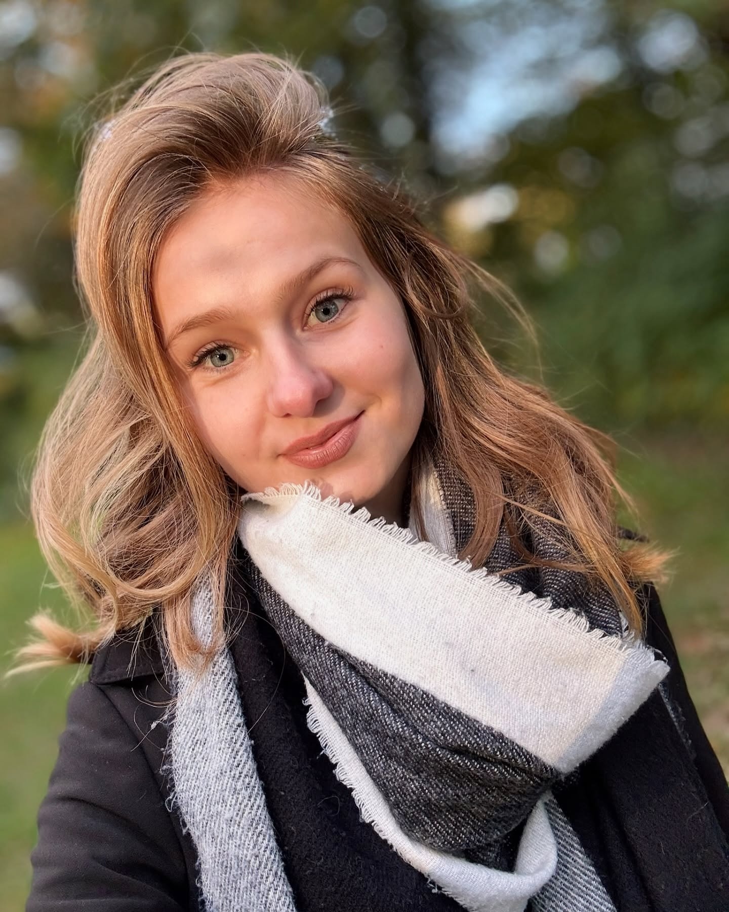 Enigmatic Allure: Blurred Portrait with Nature Accents