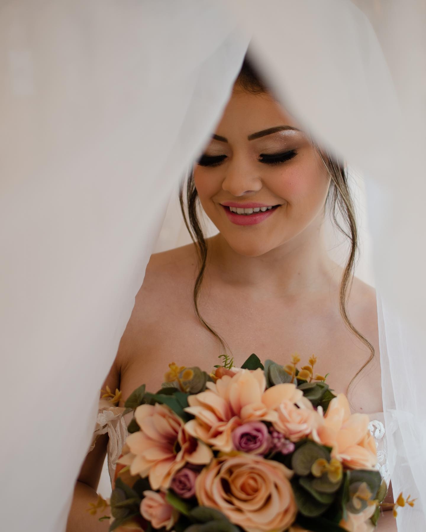 Ethereal Wedding Prelude: Veil and Bouquet Intimacy
