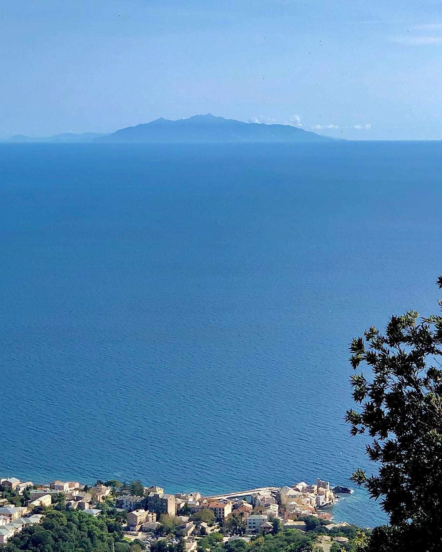 Calm Horizons: Elba and Corsica Coastline