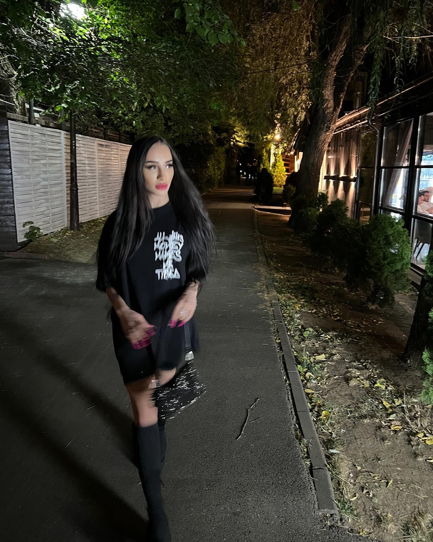 Nocturnal Stroll: Confident Nighttime Lifestyle Portrait