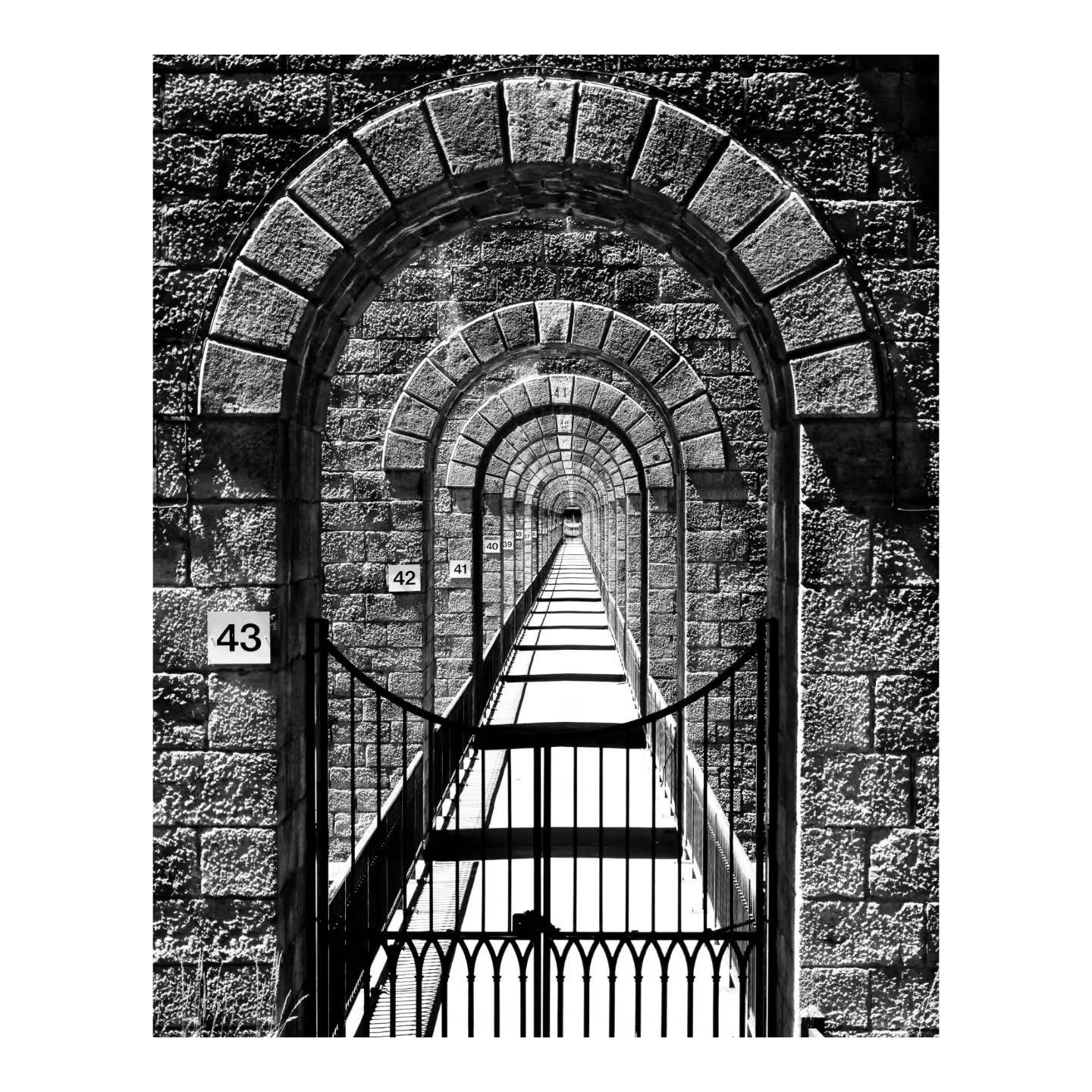 Portal to the Past: Stone Archway and Iron Gate