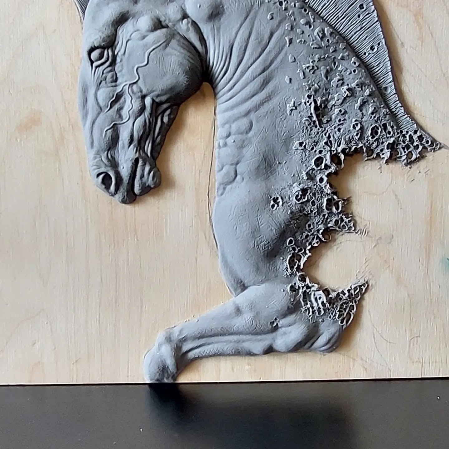 Equine Elegance: Gray Clay Sculpture