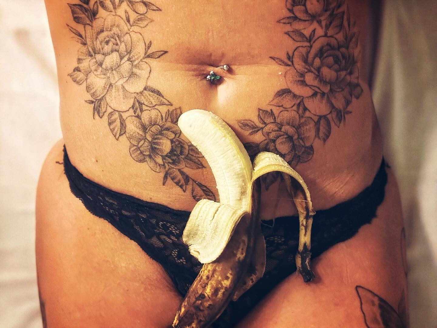 Embracing Artistry: Tattoos and Intimacy in Moody Light