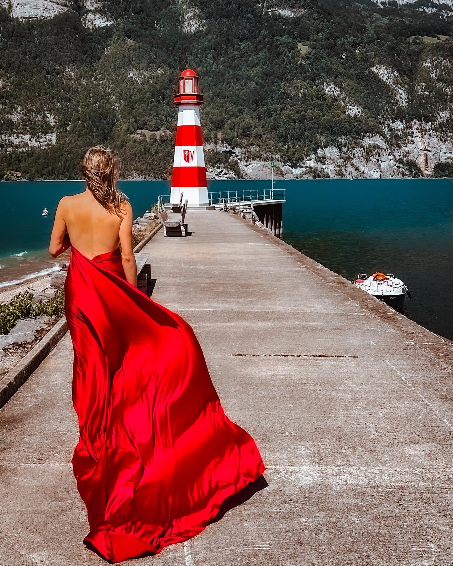 Serene Escape: A Red Dress at Unterterzen Pier