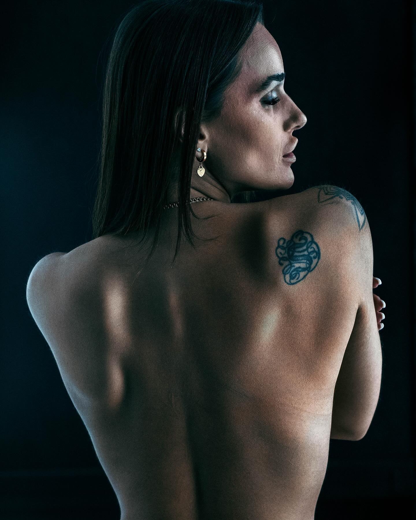 Subtle Elegance: A Close-Up Portrait of Emotion and Detail