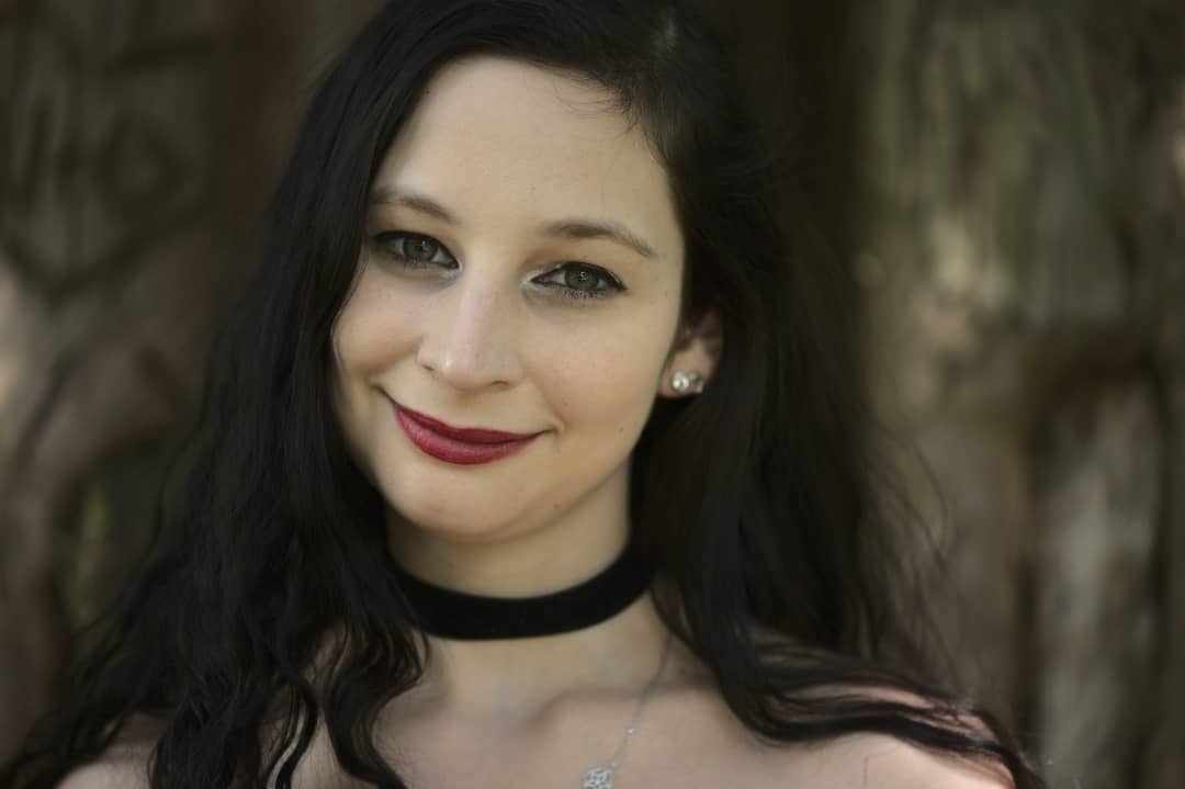 Alice's Bold Portrait: Confidence in Red Lips and Waves