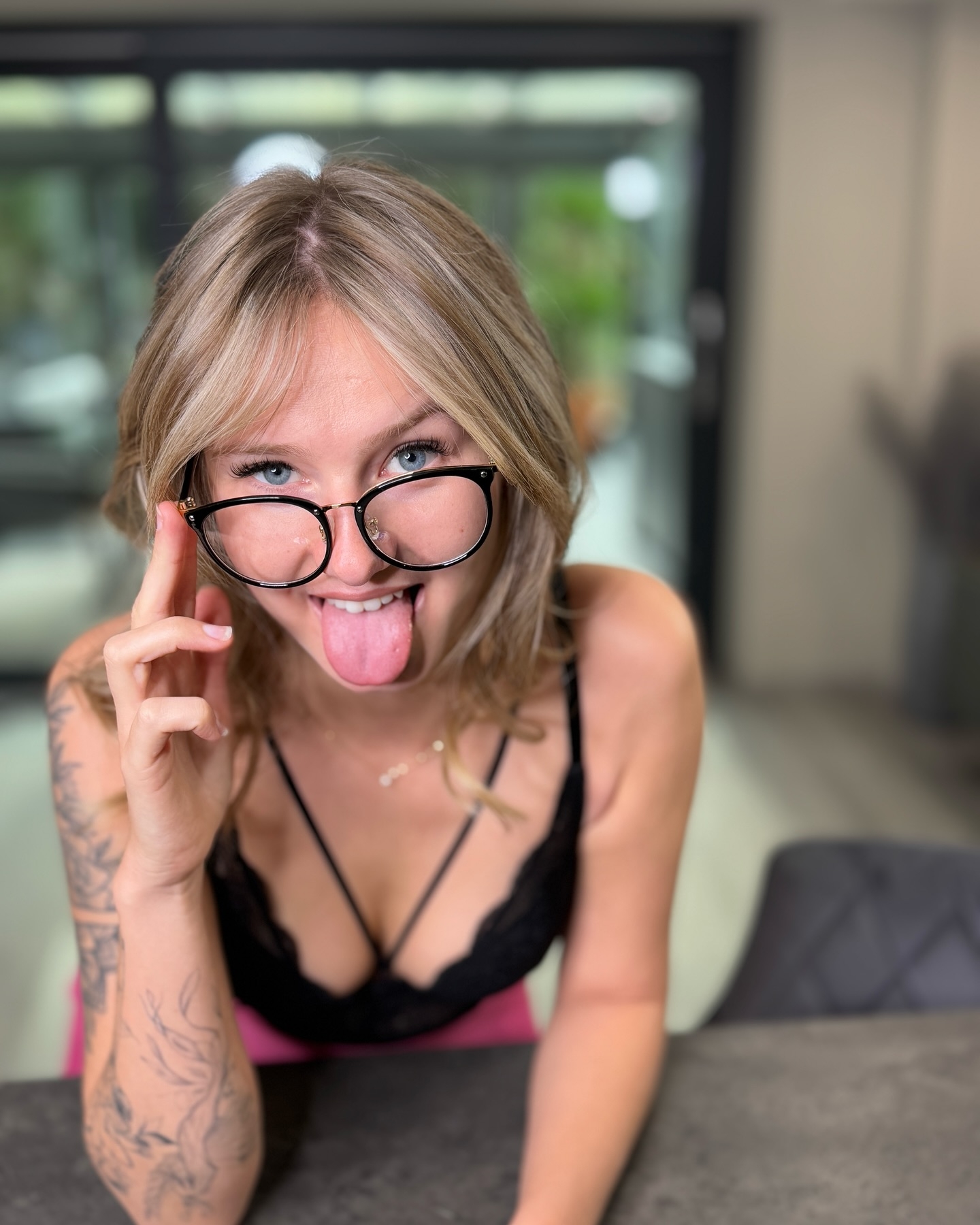 Confident Edge: Playful Portrait with Tattoos and Personal Style