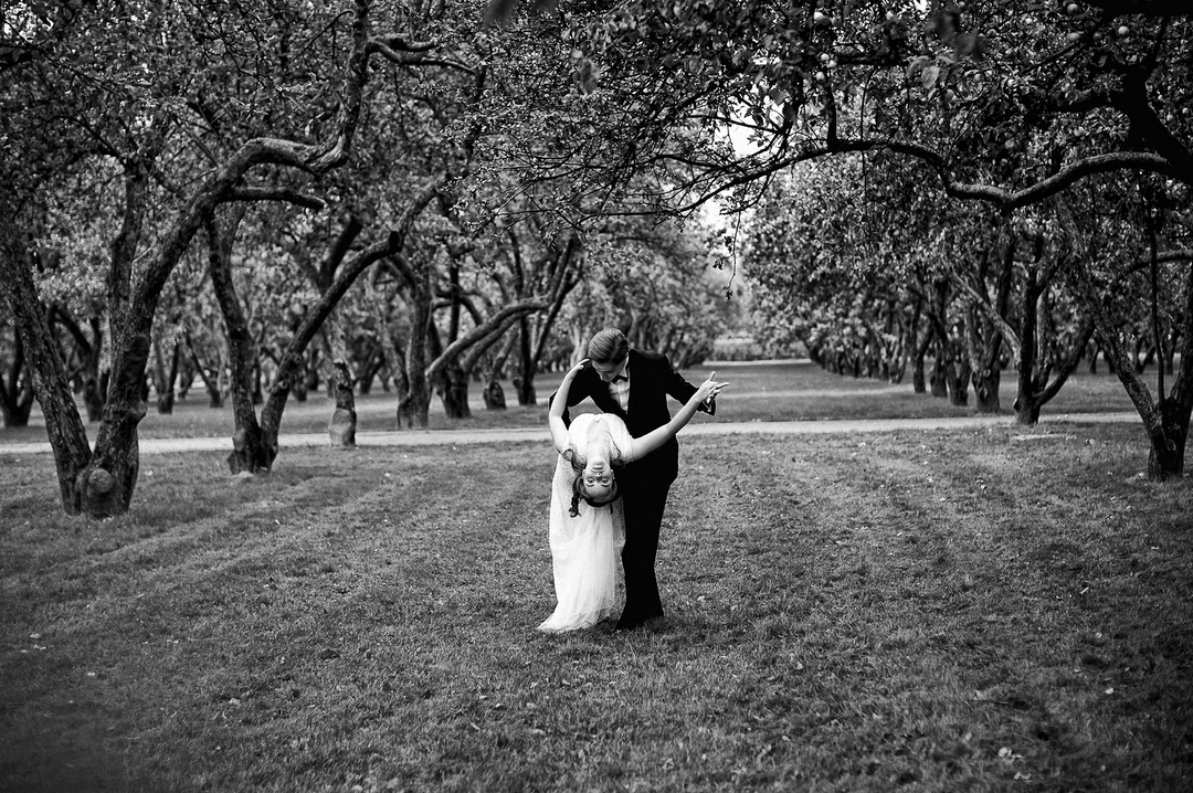 Weightless Embrace: A Surreal Orchard Wedding
