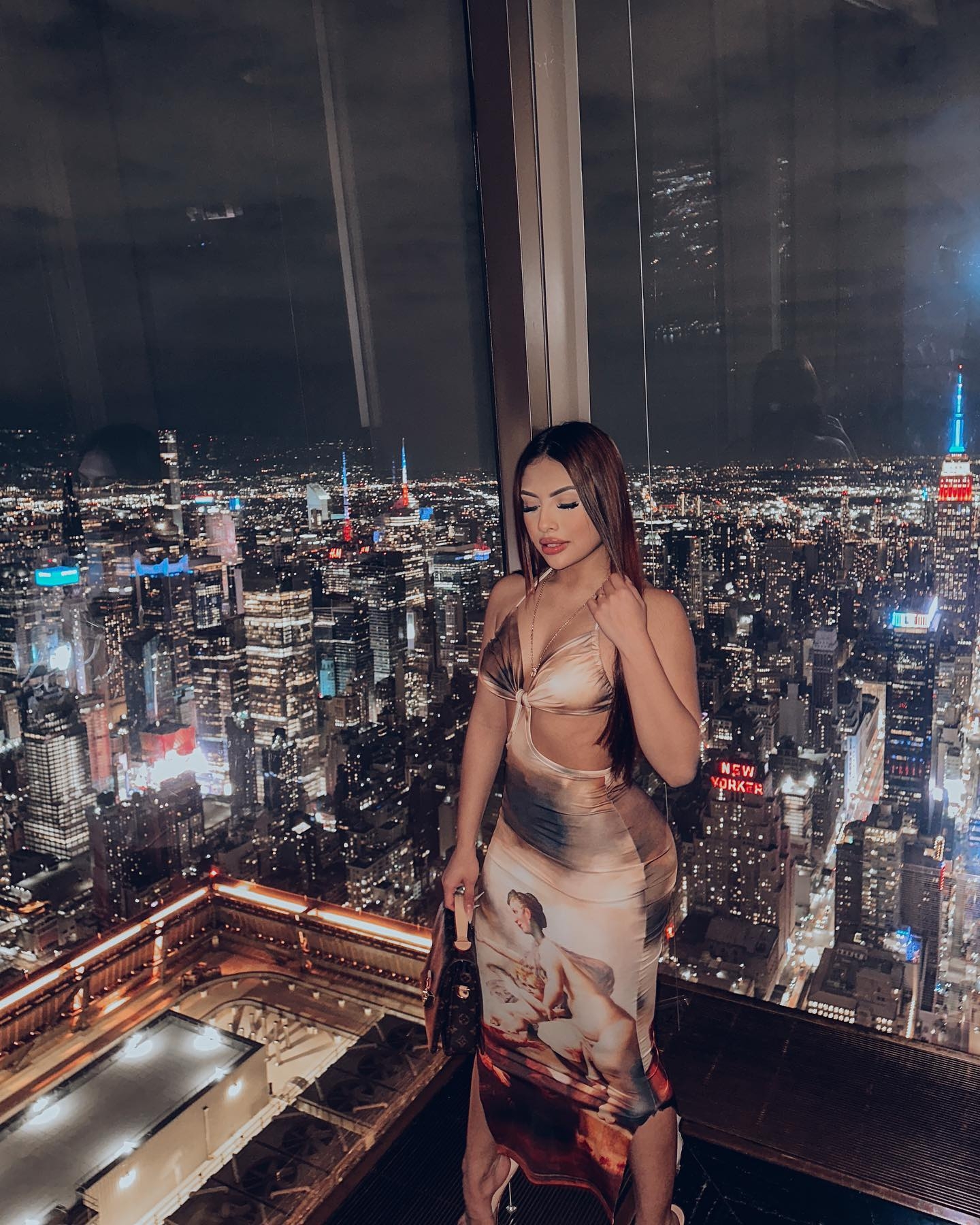 Nightlit Elegance: City Skyline & Sophisticated Style