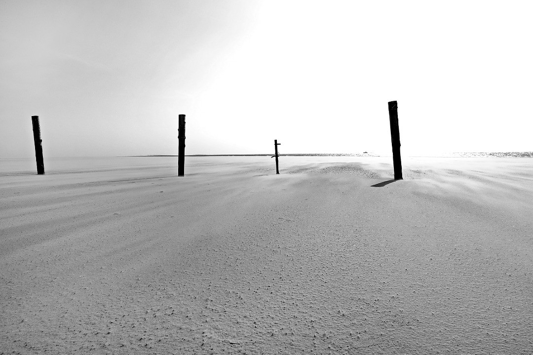 Ethereal Desolation: Beach of Forgotten Poles