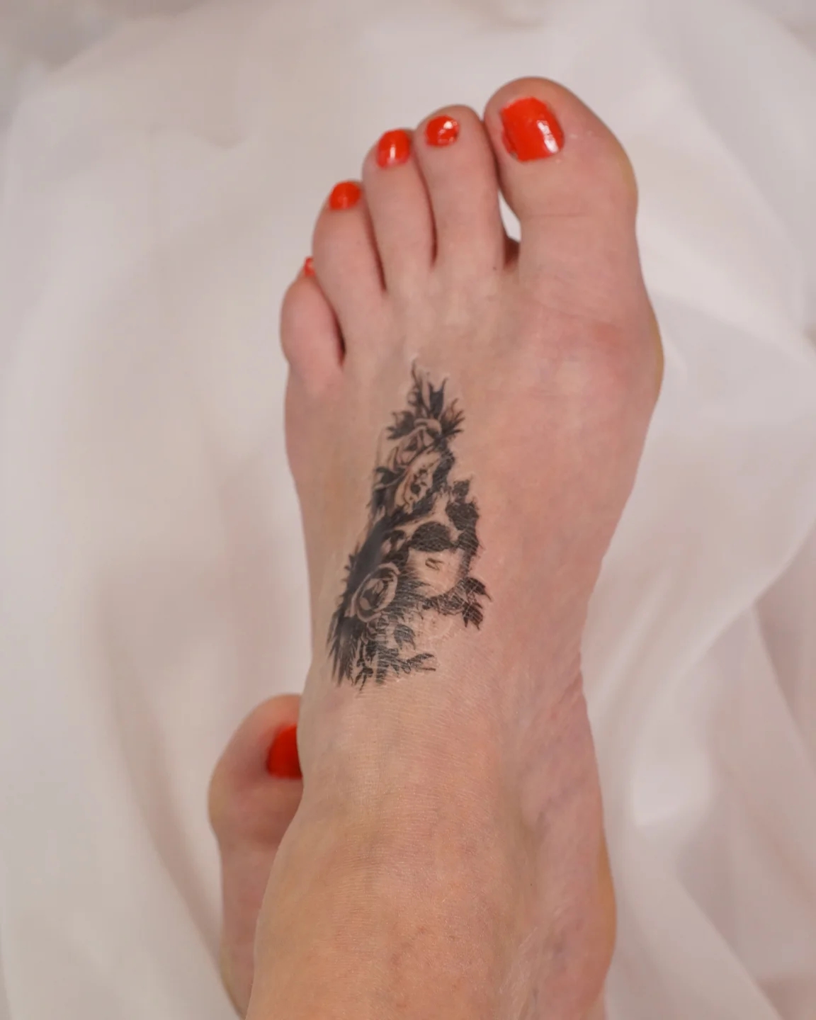 Inked Elegance: Close-Up Foot Art with Exclusive Behind-the-Scene Shots